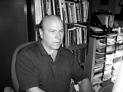 K.L.Storer in his office at home